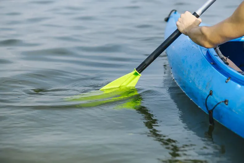 man-paddling-kayak-lakejpg
